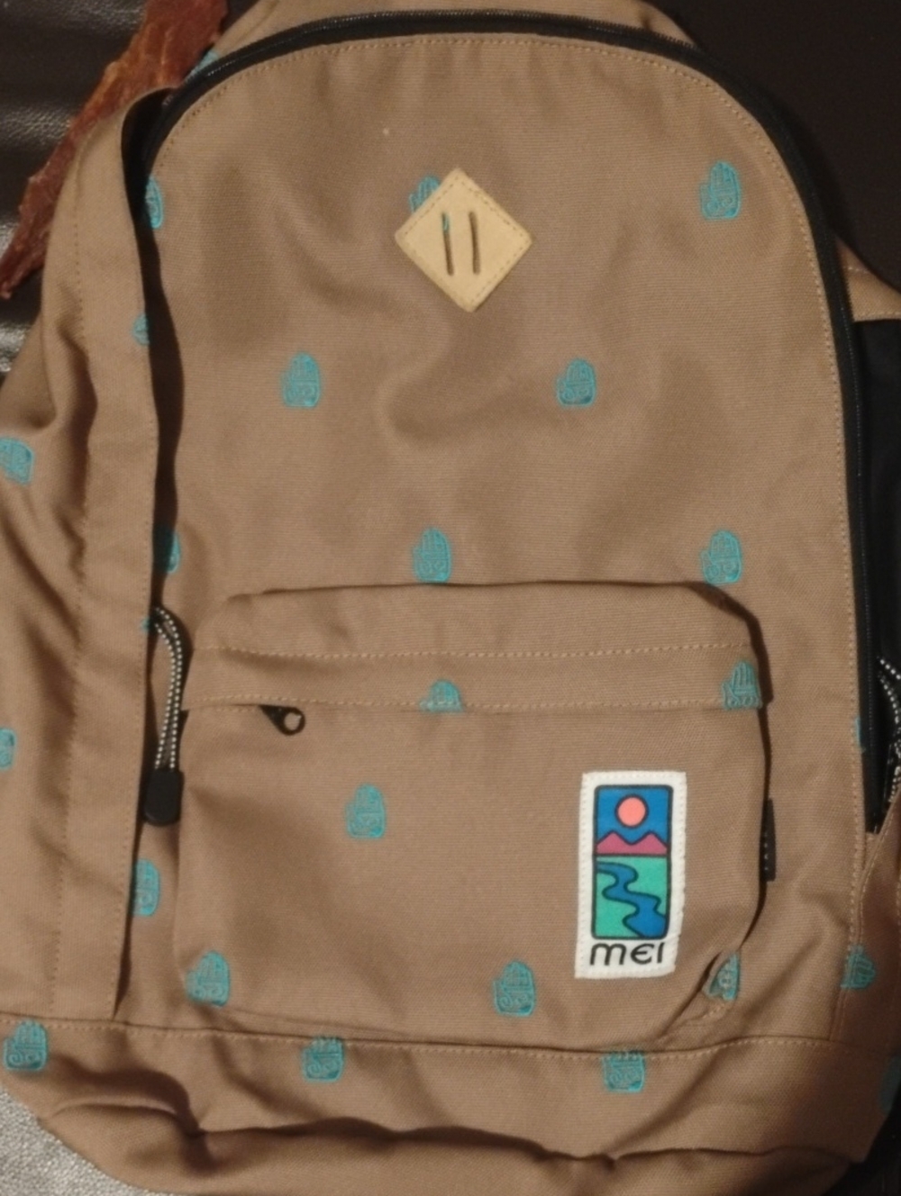 ME Makeover Essentials Tan Backpack with Teal Embroidered Motifs